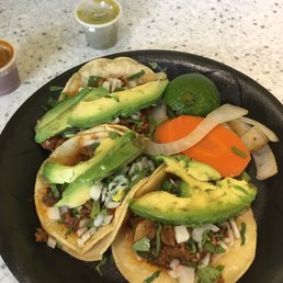 Two pastor, one chicken, two TINY containers of red and green sauce :( Two pastor, one chicken, two TINY containers of red and green sauce :(