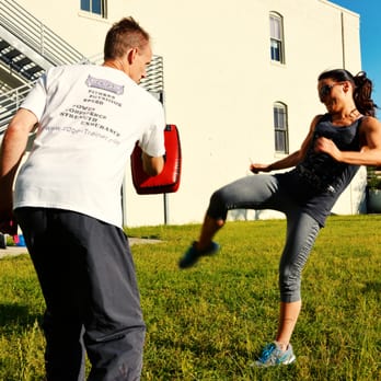 The Edge Personal Training - Warming up outside with some Muay Thai kicking. - Trainers Near Me - Houston, Texas