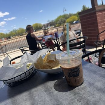 Switch Brews - Outdoor seating and the artichoke dip with an iced coffee. - Coffee & Tea Near Me - Queen Creek, Arizona
