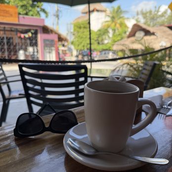 Local Coffee + Shop - Cup of coffee on the patio - Coffee & Tea Near Me - Puerto Morelos, ROO Local Coffee + Shop - Cup of coffee on the patio - Coffee & Tea Near Me - Puerto Morelos, ROO