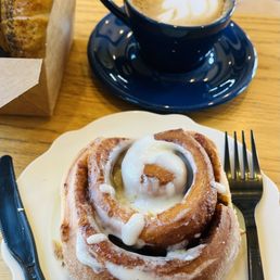 Caramel Mocha Latte, cinnamon roll, and the most delicious sausage croissant roll this side of the Atlantic (biased and unverified opinion)