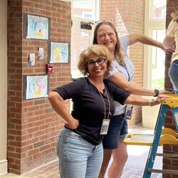 The Falls Church Episcopal Day School - Teachers setting up for our annual student art show.
