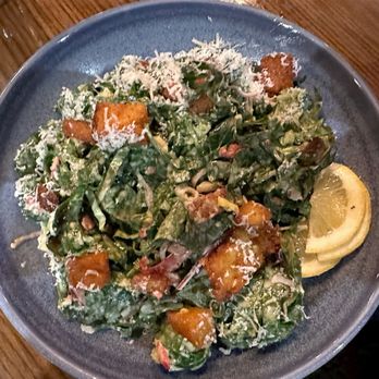 COMMUNION Restaurant and Bar - Kale Caesar salad. - Soup Near Me - Seattle, Washington COMMUNION Restaurant and Bar - Kale Caesar salad. - Soup Near Me - Seattle, Washington