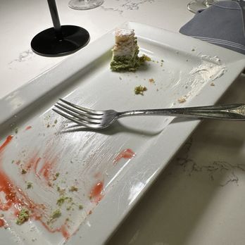 ICCARA Italian Bistro - Evidence of deliciousness of the pistachio mouse cake! - Italian Near Me - Cape May, New Jersey ICCARA Italian Bistro - Evidence of deliciousness of the pistachio mouse cake! - Italian Near Me - Cape May, New Jersey