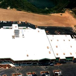 AllPro Roof Innovations - Photograph Used to Example the Results of Using the Fabric Reinforced Roofing System on a Commercial Building.