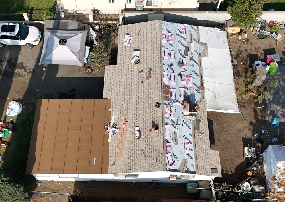 Slide of Mega Roofing