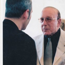 I think this is Clive Davis who is a leader in the industry of aristo records. I think Ted Cohen worked with him quite a bit.
