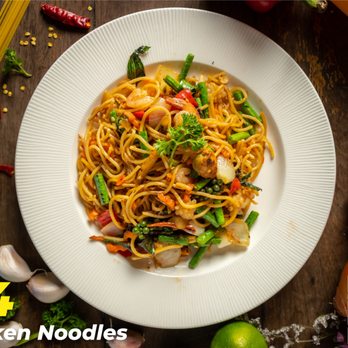 Siam Street food - a plate of stir fried noodles - Food Trucks Near Me Siam Street food - a plate of stir fried noodles - Food Trucks Near Me