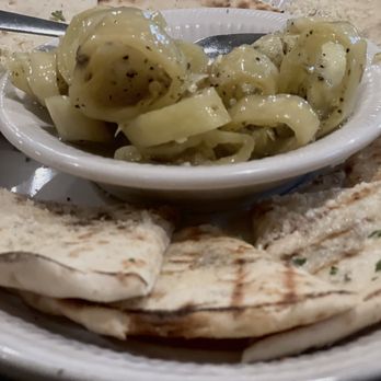 Covered Bridge Inn - Hot peppers in oil served with fresh baked warm seasoned pita bread - Italian Near Me - Newton Falls, Ohio Covered Bridge Inn - Hot peppers in oil served with fresh baked warm seasoned pita bread - Italian Near Me - Newton Falls, Ohio