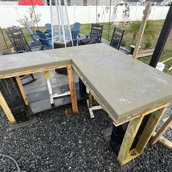 PioneerExpress - Creating a rock-salt finish on the custom concrete outdoor counter top. - Masonry/Concrete Near Me PioneerExpress - Creating a rock-salt finish on the custom concrete outdoor counter top. - Masonry/Concrete Near Me