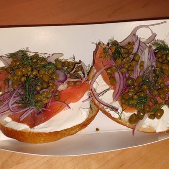 The Bagel Mill - Haphazardly prepared lox bagel topped with a galaxy of capers. - Bagels Near Me - Petaluma, California The Bagel Mill - Haphazardly prepared lox bagel topped with a galaxy of capers. - Bagels Near Me - Petaluma, California