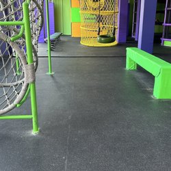 Get Air Trampoline Park - Part of play are that shows dust underneath balance beam