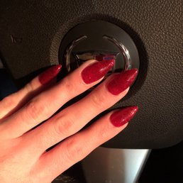 Red glittery stiletto gel nails!!