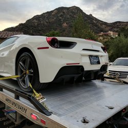 Catalyst Cars - 2017 Ferrari 488 Spider about to be unloaded at a clients house.