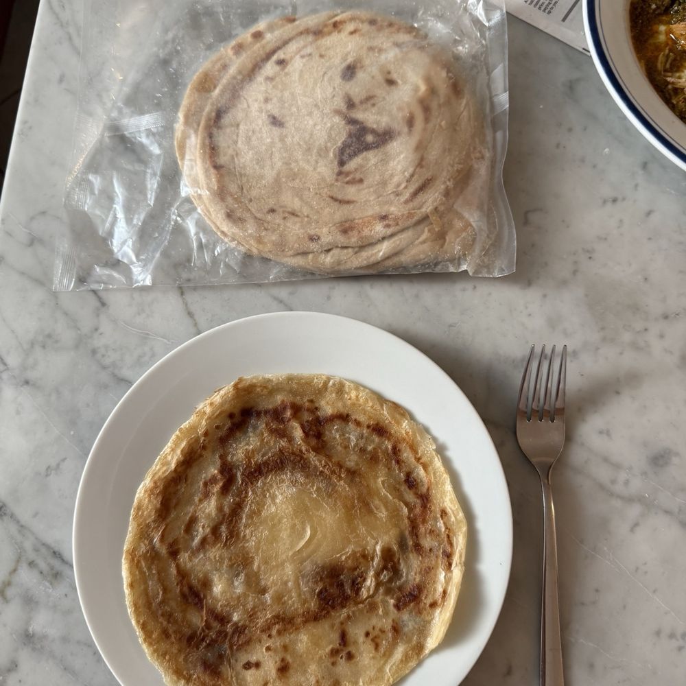 Naan -N- Curry - Latcha paratha from the restaurant and package of frozen ones from the store (5 for $4.99!) - Indian Near Me - Renton, Washington Naan -N- Curry - Latcha paratha from the restaurant and package of frozen ones from the store (5 for $4.99!) - Indian Near Me - Renton, Washington