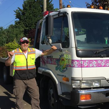 Kokua Towing - Owner Gary w/Sally one of our flatbeds. - Towing Near Me - Roseburg, Oregon Kokua Towing - Owner Gary w/Sally one of our flatbeds. - Towing Near Me - Roseburg, Oregon