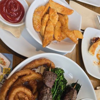 California Pizza Kitchen - Spicy Buffalo Cauliflower, Side Crispy Potatoes, Filet Skewers with Chimichurri Duo - Pizza Near Me - Aiea, Hawaii California Pizza Kitchen - Spicy Buffalo Cauliflower, Side Crispy Potatoes, Filet Skewers with Chimichurri Duo - Pizza Near Me - Aiea, Hawaii