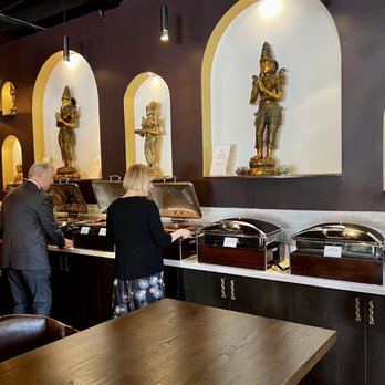 Andaaz - a group of people in a restaurant - Buffets Near Me - Asheville, North Carolina