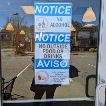 Mario’s Pizzeria - a sign in the window - Pizza Near Me - Wake Forest, North Carolina