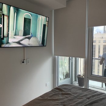 Chicago TV Installer - TV install in bedroom. - Home Theatre Installation Near Me