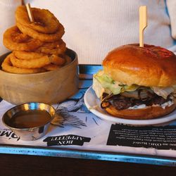 OMG Resto - Smash burger with onion rings.
