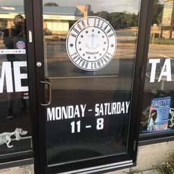 Rhode Island Tattoo Company - Brand new shop , and let me tell you it was impressive!  Definitely recommend them! They were all very polite and helpful!