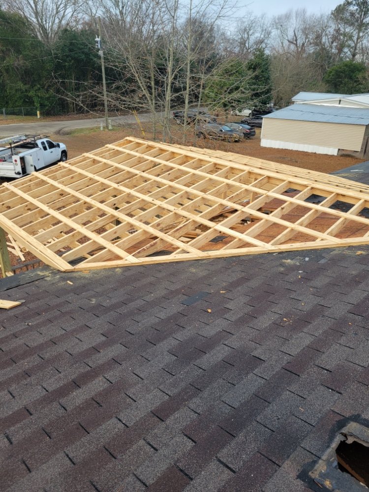 Slide of R and T Roofing and Remodeling