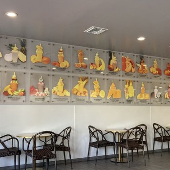 Cascada Refrescante - The wall menu.. lol.. creative - Juice Bars & Smoothies Near Me - Paramount, California
