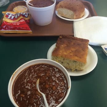 Soup Kitchen Express - Chili with Mexican cornbread in the foreground. Chili with cheese bread and Fritos in the background. - Cafes Near Me - Knoxville, Tennessee