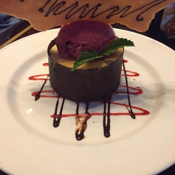 Downtown Aquarium - Cheesecake dessert w/sorbet was amazing. (The smudge is where the spoons were.) - Museums Near Me - Denver, Colorado