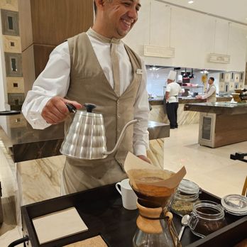Le Blanc International Restaurant - Juan our server/barista! That was some smooth tasting drip coffee! - Specialty Food Near Me - Cancún, ROO