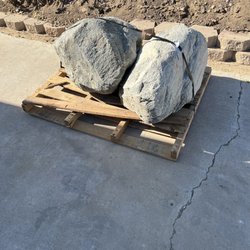 Thompson Building Materials - Boulders on far side of driveway.