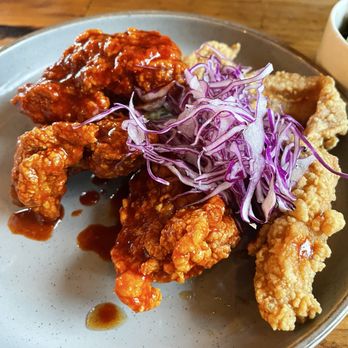 Step Korean Bistro - Fried Chicken Appetizer Sweet & Spicy on the left and Soy Garlic on the right - Korean Near Me - Sparks, Nevada Step Korean Bistro - Fried Chicken Appetizer Sweet & Spicy on the left and Soy Garlic on the right - Korean Near Me - Sparks, Nevada