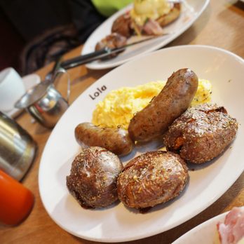 Lola - pork maple sausage and Smashed Garlic Fried Potatoes - Greek Near Me - Seattle, Washington Lola - pork maple sausage and Smashed Garlic Fried Potatoes - Greek Near Me - Seattle, Washington