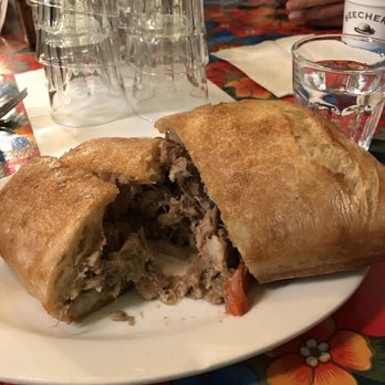 Salumi - Porky awesome porchetta sandwich - Italian Near Me - Seattle, Washington