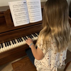 Piano Lessons with Miss Kristina - Charlotte playing on her new piano with her skills thanks to Miss Kristina