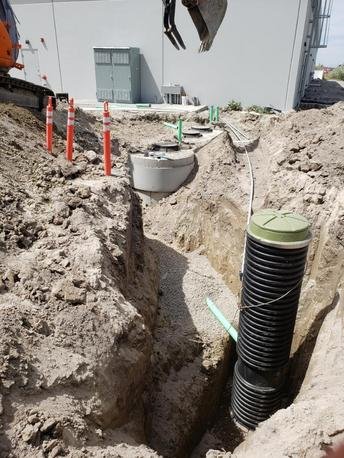 Slide of Dick's Backhoe & Sewer Connection