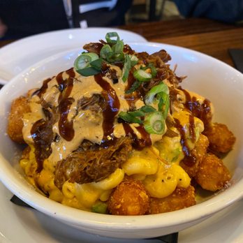 Plank Craft Kitchen & Bar - Rock n Tots with jalapeño Mac n cheese and pulled pork - American Near Me - Folsom, California Plank Craft Kitchen & Bar - Rock n Tots with jalapeño Mac n cheese and pulled pork - American Near Me - Folsom, California