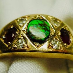Richmond Gold - 14k ring embedded with a large Ammonite crystal, two rubies and four diamonds. The ring can be worn on a female or male. Size 9,  Resizable.