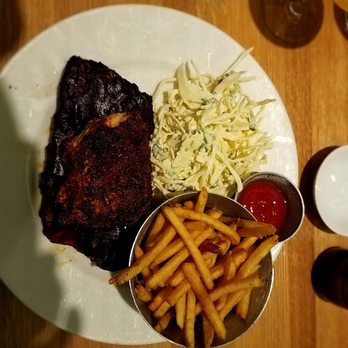 Earls Kitchen + Bar - 1/2 slab ribs and Cajun chicken. - New American Near Me - Somerville, Massachusetts