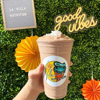 La Villa Nutrition - a hand holding a cup of coffee - Juice Bars & Smoothies Near Me - Greenfield, Wisconsin La Villa Nutrition - a hand holding a cup of coffee - Juice Bars & Smoothies Near Me - Greenfield, Wisconsin