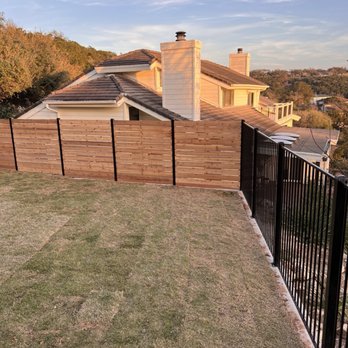 HA Dirt Cleaning & Construction - Retaining wall, 6-ft iron fence, horizontal wood slat privacy fence, new irrigation, and new sod. - Excavation Services Near Me