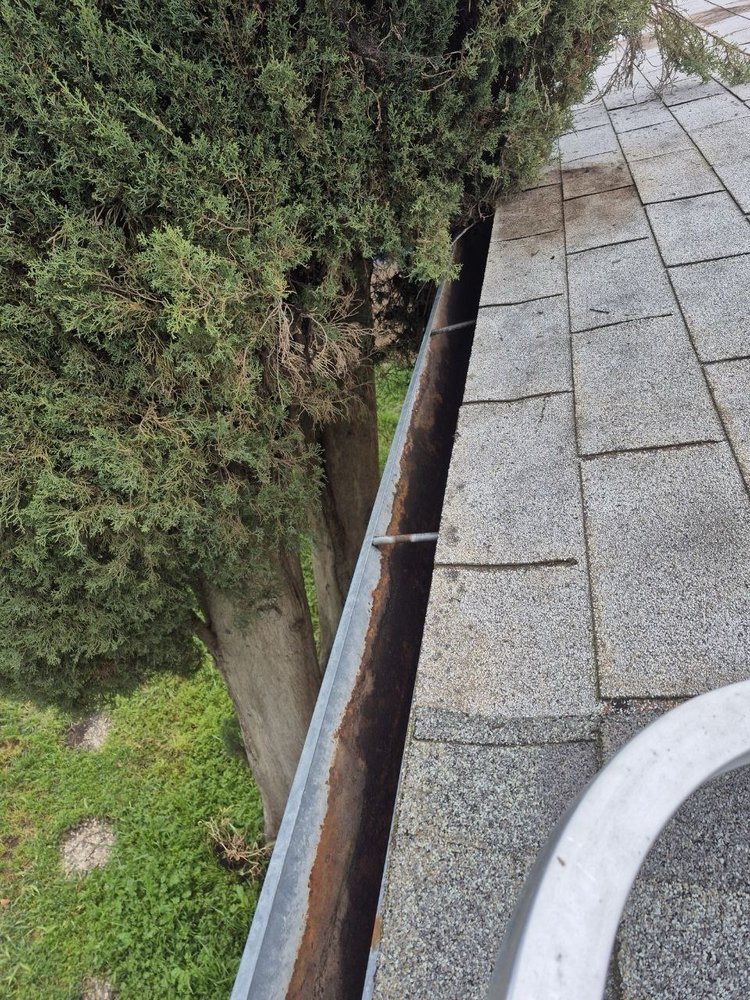 Slide of Cleaning Gutters Service