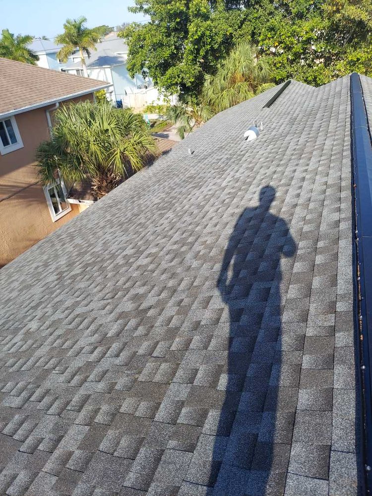 Slide of Compass Roofing Services