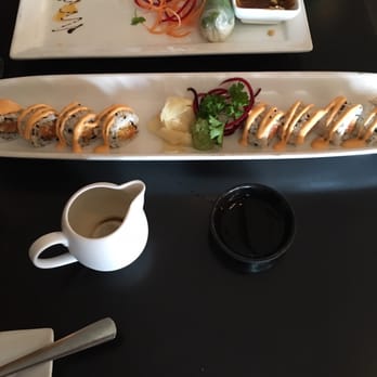 Pho Thi Fusion - a plate of sushi and a cup of coffee - Asian Fusion Near Me - Nepean, Ontario