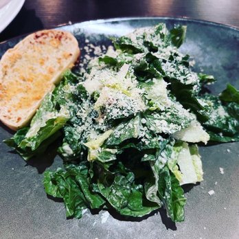 Saltyard - Caesar salad (split into two portions) - New American Near Me - Burlingame, California Saltyard - Caesar salad (split into two portions) - New American Near Me - Burlingame, California