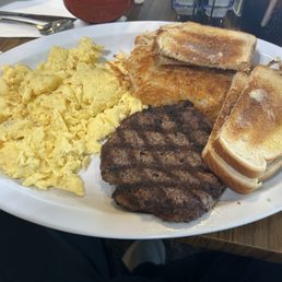 Hamburger patty and eggs