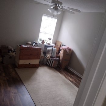 Ellerby Enterprises - an empty room with a fan - Flooring Near Me Ellerby Enterprises - an empty room with a fan - Flooring Near Me