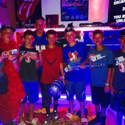 Cooperstown Escape Rooms - Baseball building there teamwork in lock n roll escape room