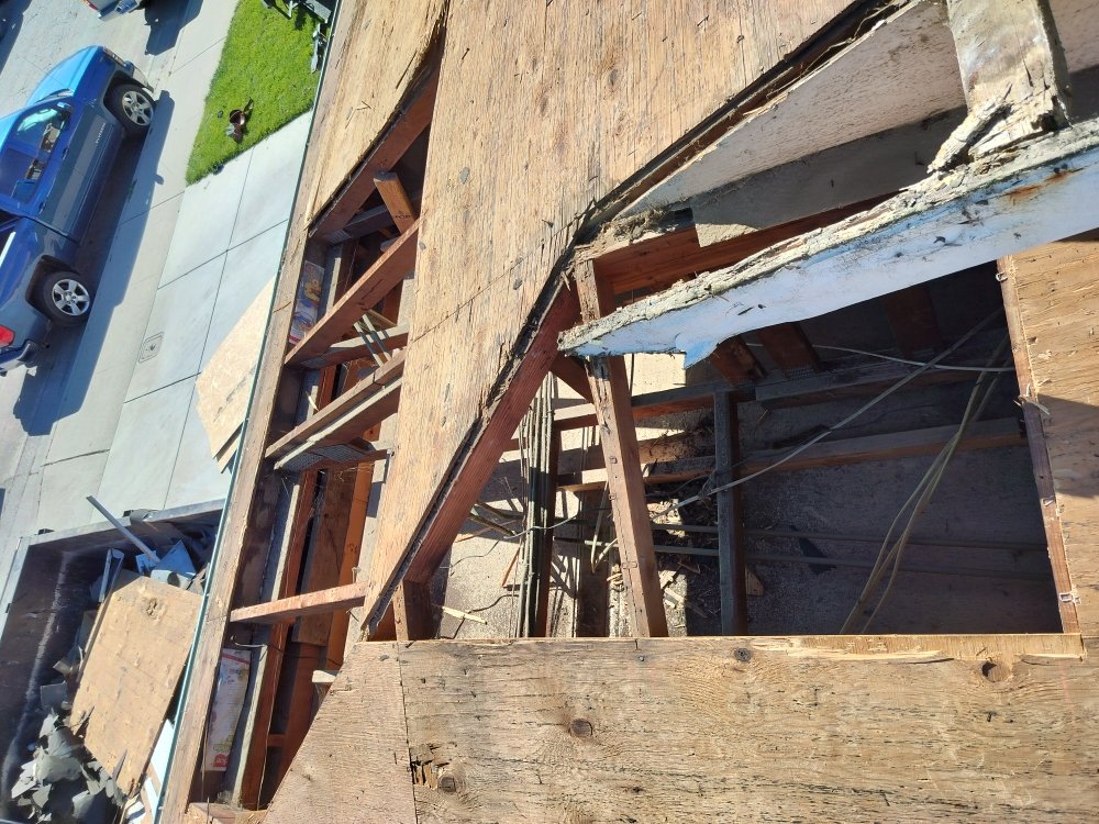 Slide of Pacific Roofing